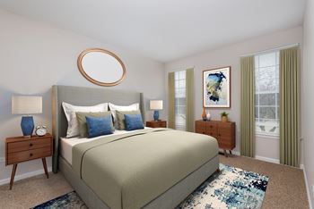 A bedroom with a large bed and a painting on the wall.